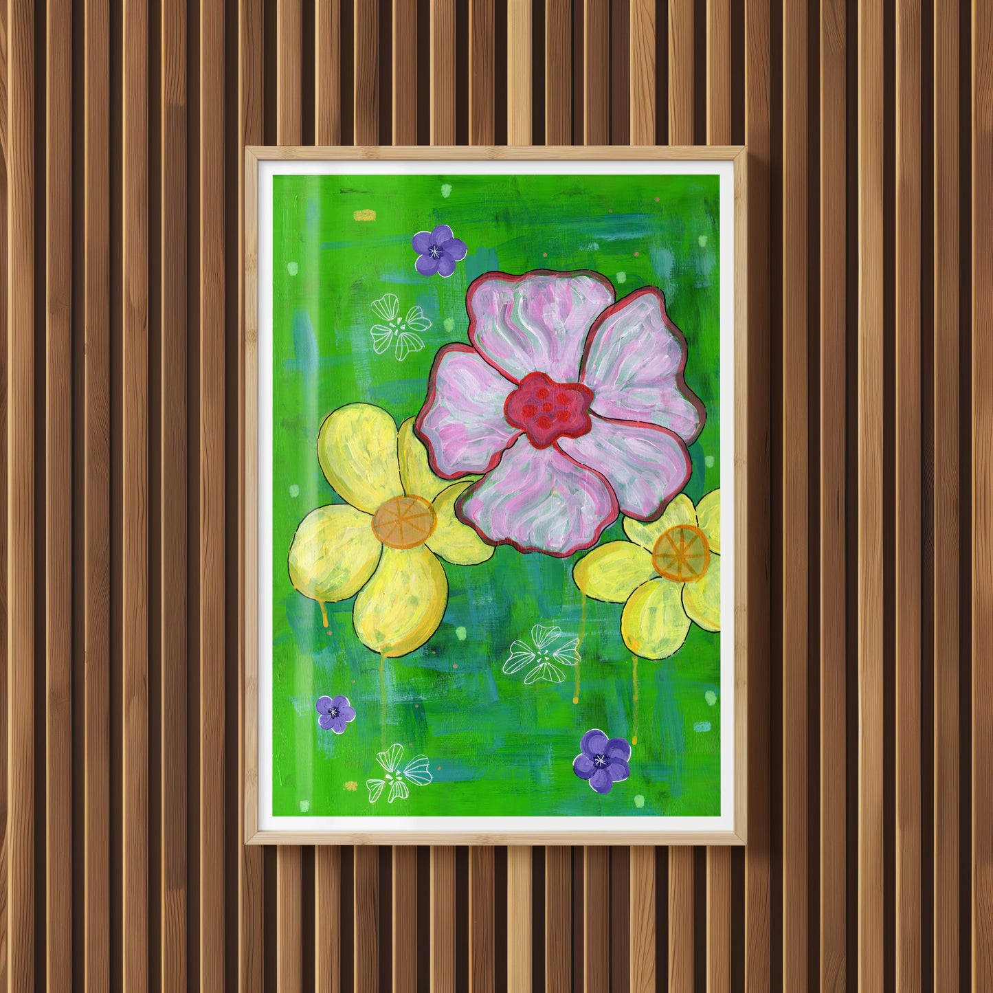 Insitu Find the Light print pictured framed hanging on a wooden panelled wall. Print artwork contains a pink hibiscus flower and two frangipani's on an abstract green background. Print by MZ LEW ART copyright 2024.