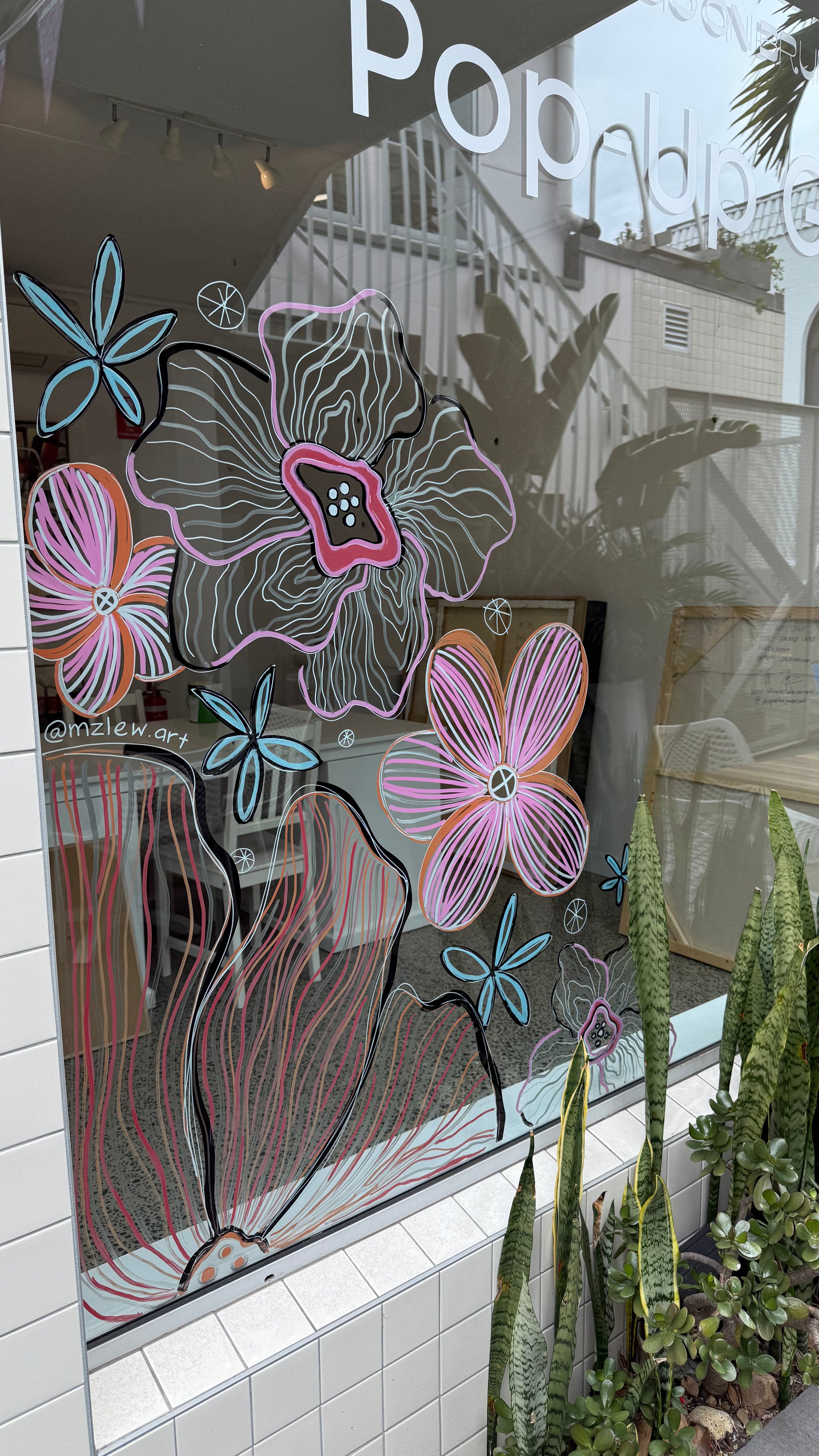 Botanical window mural by MZ Lew on the Studio on Brunswick window. 2025. 